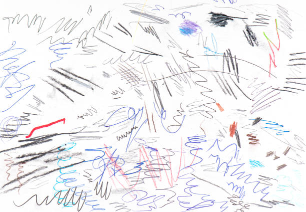 White paper with scribbles by pen, ink, and other coloring materials.