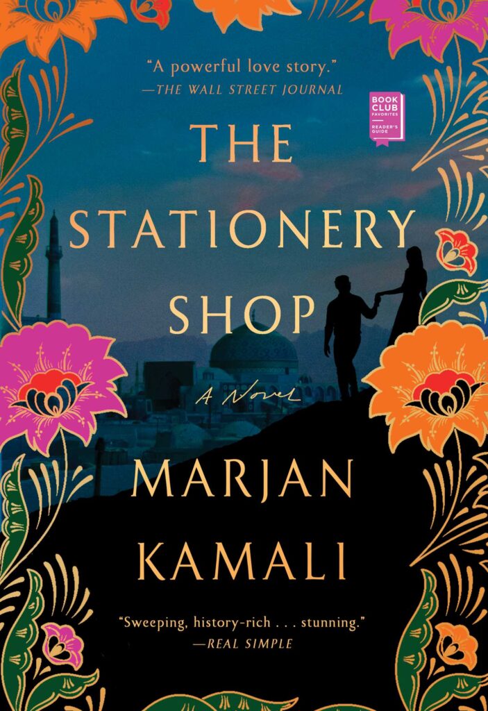 Book cover for "The Stationary Shop" by Marjan Kamali featuring bright flowers bordering a dark scene with two characters holding hands walking down a hil..