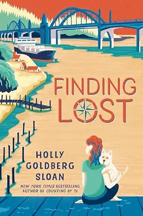 A book cover of "Finding Lost" by Holly Goldberg Sloan. The cover shows a girl with red hair sitting with a white dog by a river. 