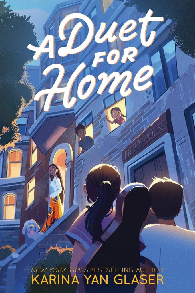 Book cover for "A Duet for Home" by Karina Yan Glaser. Illustrates a  neighborhood scene with diverse children at windows, conveying community.