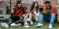 College students studying together on their college campus.