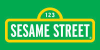 Green street sign that says 123 Sesame Street.