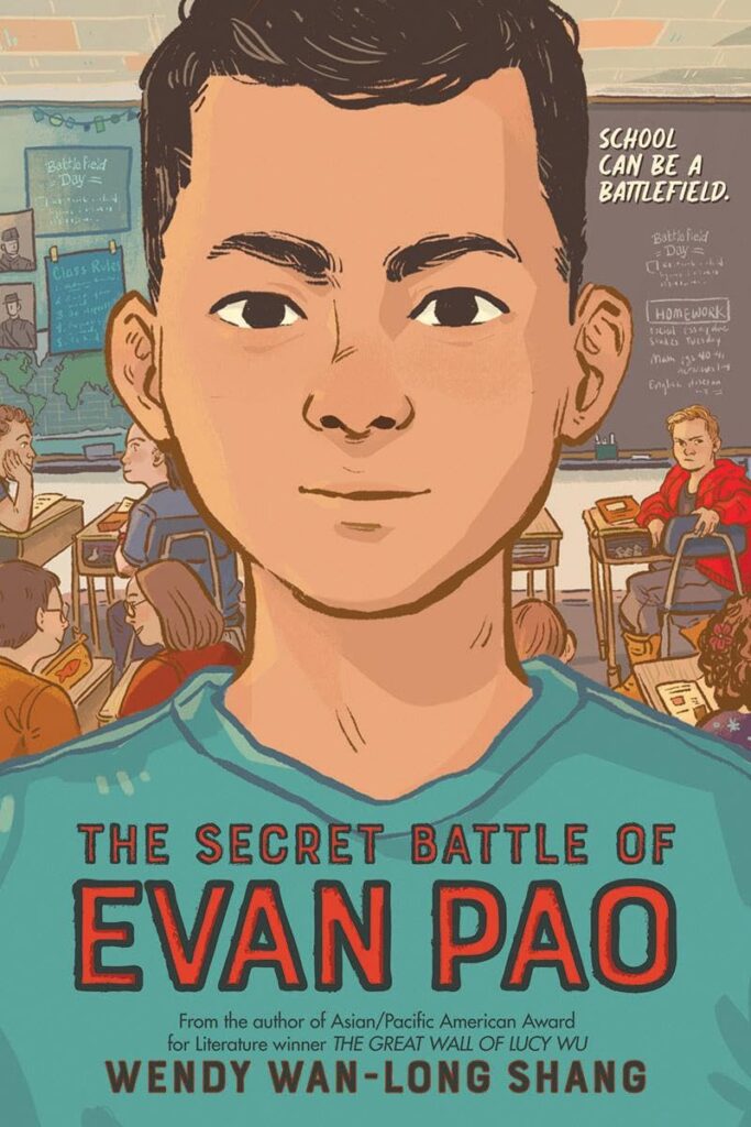 Cover for "The Secret Battle of Evan Pao" by Wendy Wan-Long Shang. Cover features a boy standing at the back of a classroom.