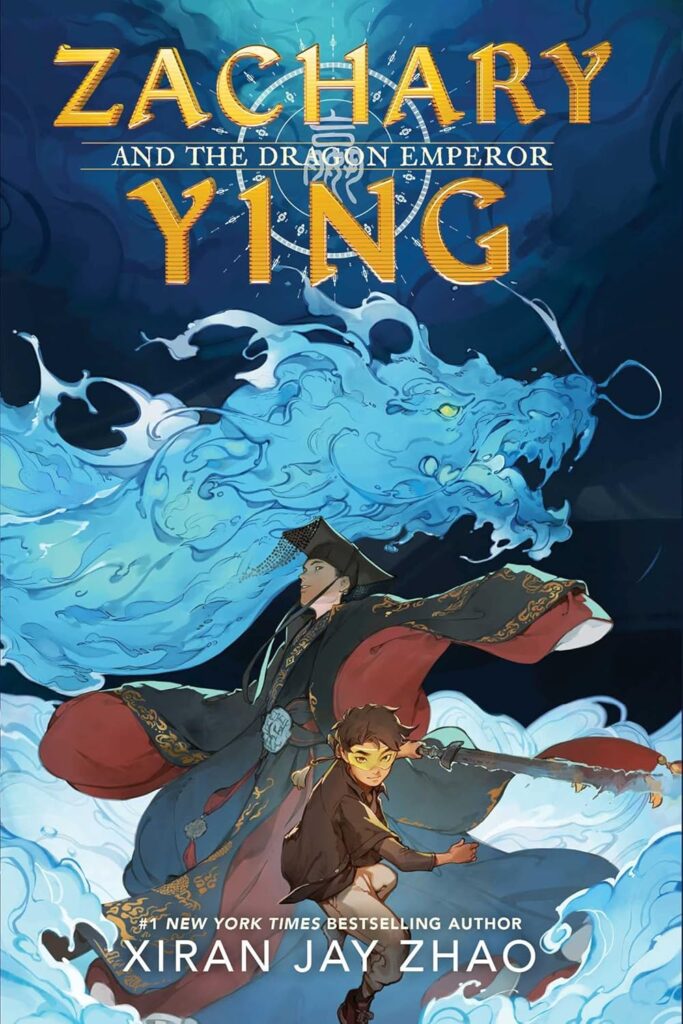 Book cover for "Zachary Ying and the Dragon Emperor" by Xiran Jay Zhao. Cover features a boy and an emperor and a blue dragon.