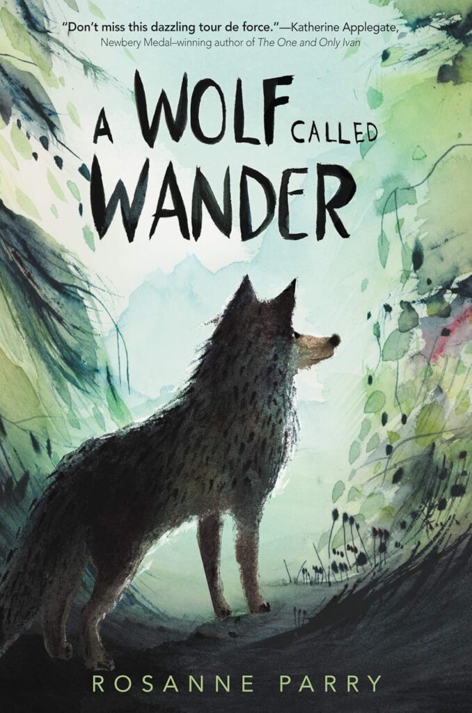 The cover of "A Wolf Called Wander" by Rosanne Parry. the cover shows a wolf cub looking into the woods.