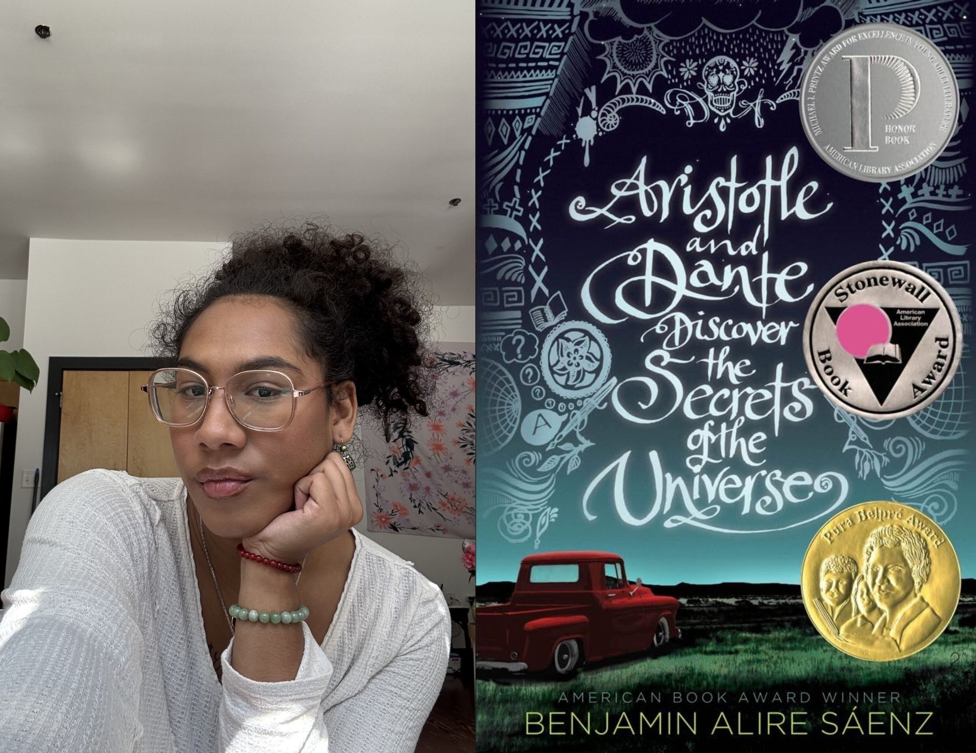 Photo of Shawn Williams, a Youth Services Associate at the Main branch, beside the cover of Aristotle and Dante Discover the Secrets of the Universe by Benjamin Alire Sáenz.