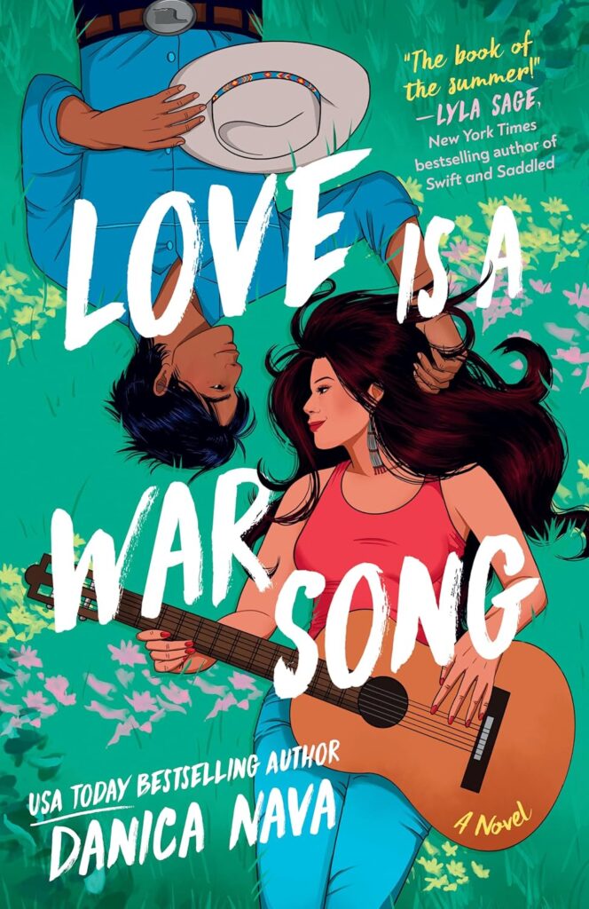 Cover of 'Love is a War Song' by Danica Nava. Cover shows a girl and a boy laying in a field of flowers and she is holding a guitar. 