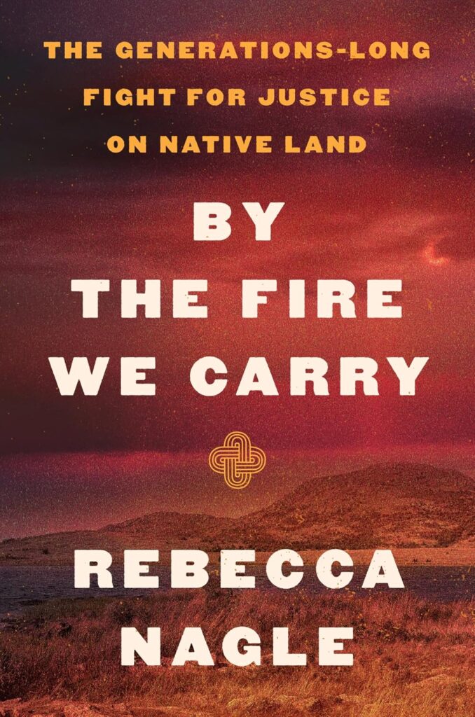 Cover of 'By the Fire We Carry' by Rebecca Nagle. Cover is red and shows a landscape. 